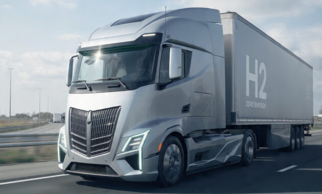 Hydrogen-powered semi-truck driving on a highway, representing the future of heavy transport.